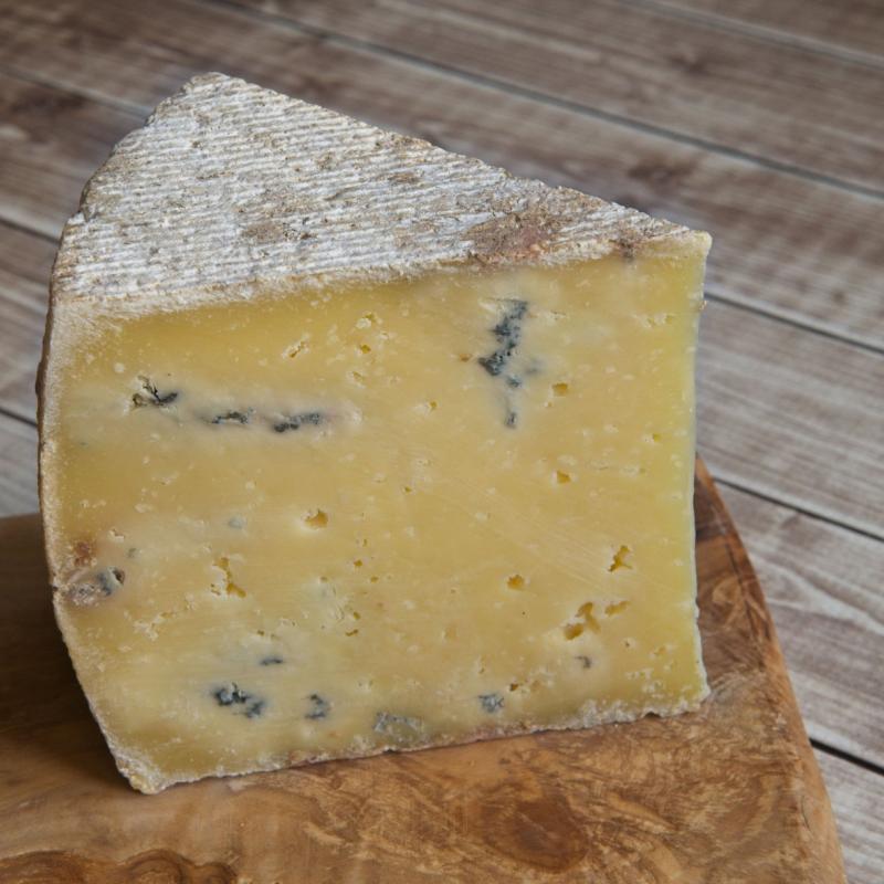 a wedge of blue cooking cheese